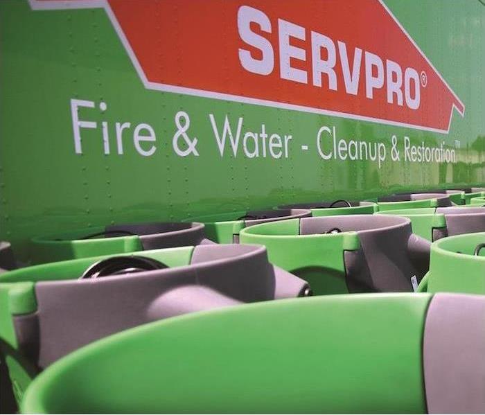 SERVPRO equipment in front of a big logo